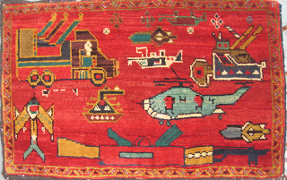 Illustration for article titled These Traditional-Style Afghani Rugs Were Inspired By Modern Warfare